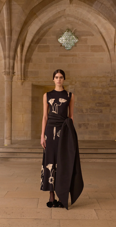 A woman wearing Johanna Ortiz oriental chronicles dress