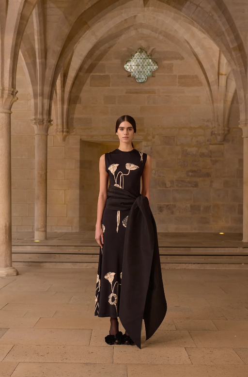 A woman wearing Johanna Ortiz oriental chronicles dress