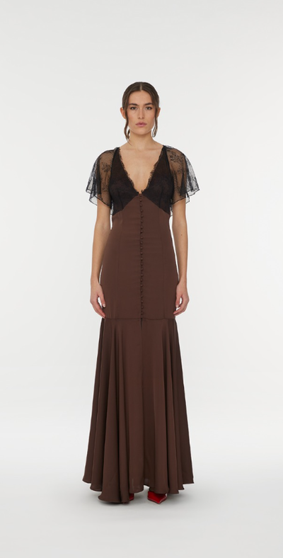 A woman wearing Rotate Birger Christensen lace maxi v-neck dress brown