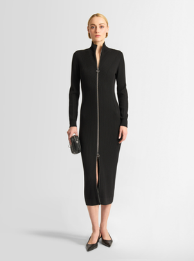 A woman wearing Fusalp black color sandrine dress