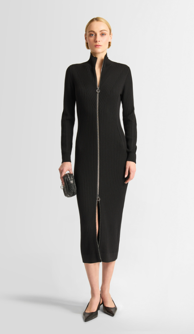 A woman wearing Fusalp black color sandrine dress