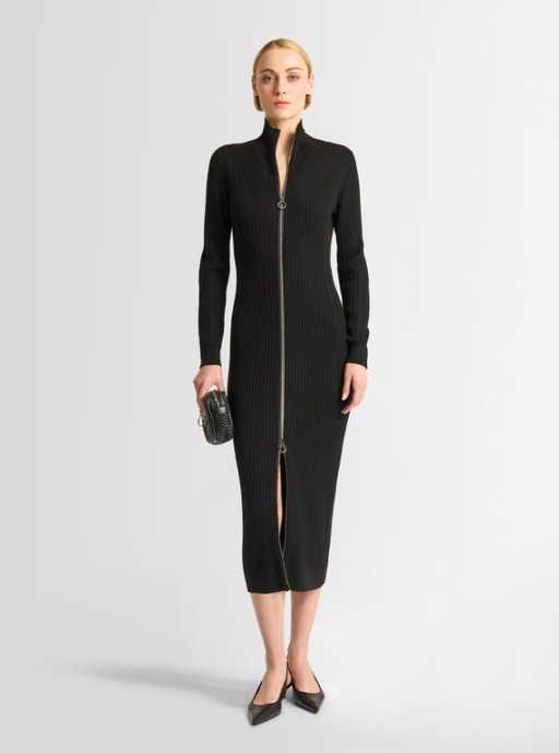A woman wearing Fusalp black color sandrine dress