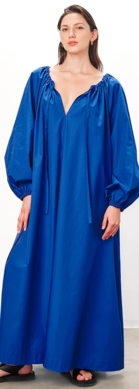 A woman wearing Mara Hoffman blue color salma dress