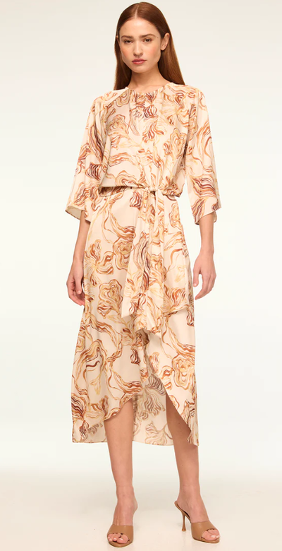 A woman wearing Misa Los Angeles straw satin adina dress