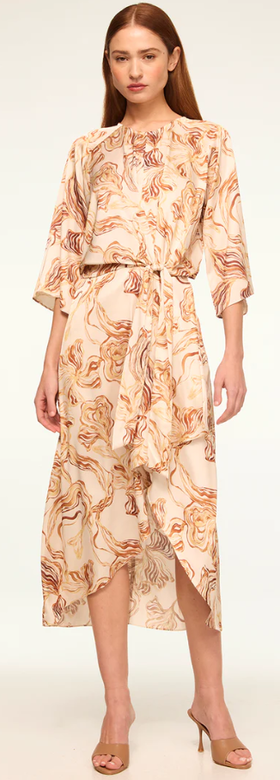 A woman wearing Misa Los Angeles straw satin adina dress