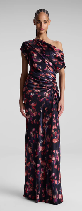 A woman wearing A.L.C. navy multi poppy stretch silk gown