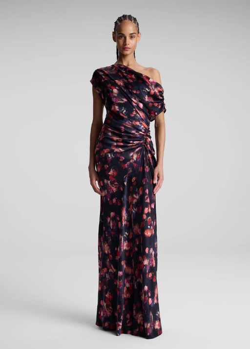 A woman wearing A.L.C. navy multi poppy stretch silk gown