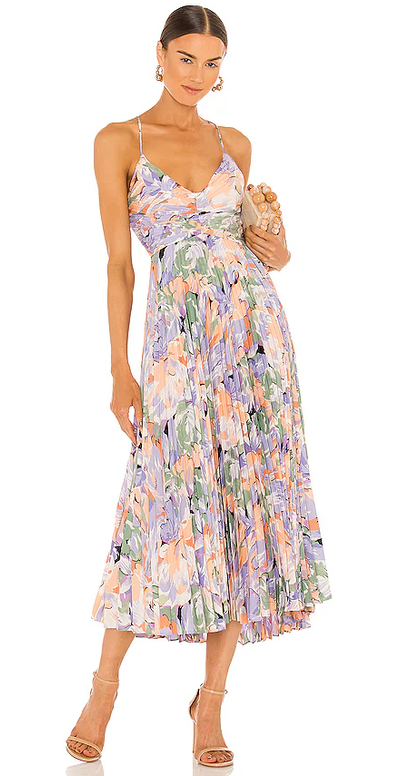 A woman wearing LPA coral multi blythe dress