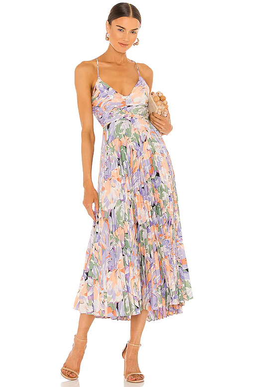 A woman wearing LPA coral multi blythe dress