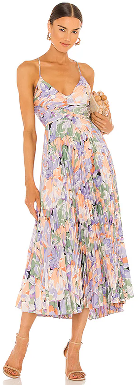 A woman wearing LPA coral multi blythe dress