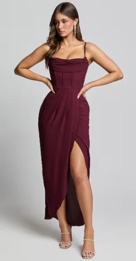 A woman wearing Showpo andrina midi dress - high low wrap corset dress in wine