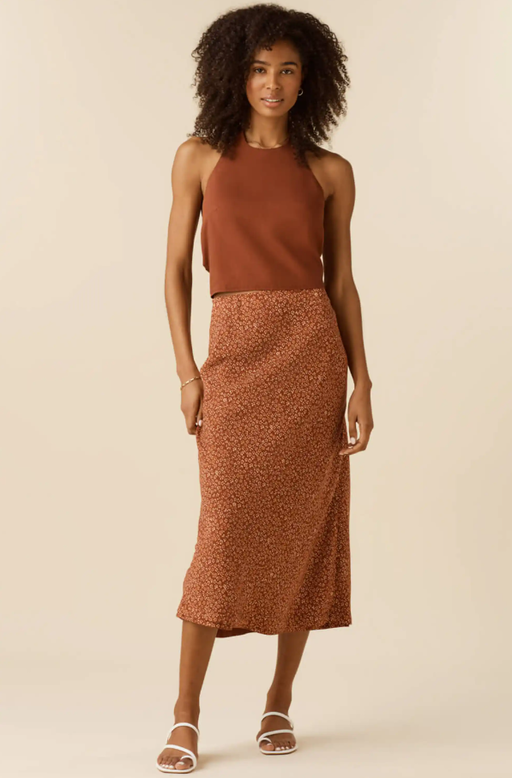 A woman wearing Vetta adobe/blossom print the two piece halter dress