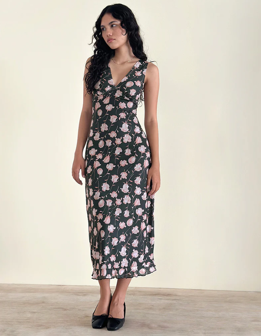 A woman wearing Motel Rocks gabriela midi dress in falling rose jet black