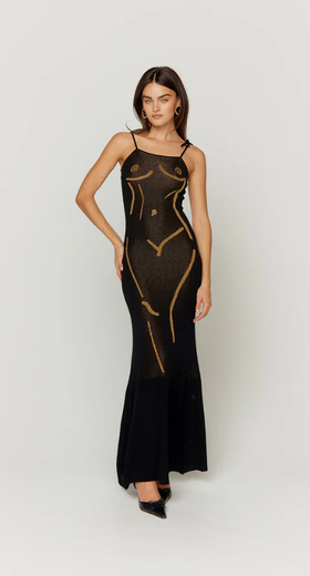 A woman wearing House of Sunny onyx the statue dress