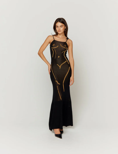 A woman wearing House of Sunny onyx the statue dress