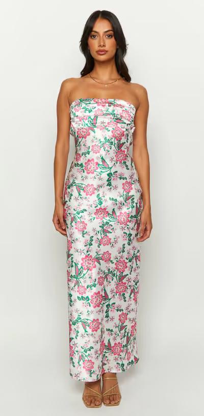 A woman wearing Beginning Boutique astra strapless floral satin midi dress