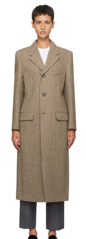 A woman wearing Dunst brown 2-way coat