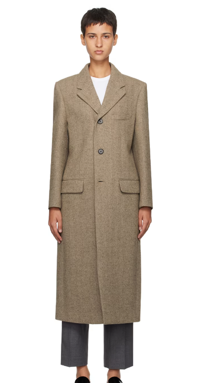 A woman wearing Dunst brown 2-way coat