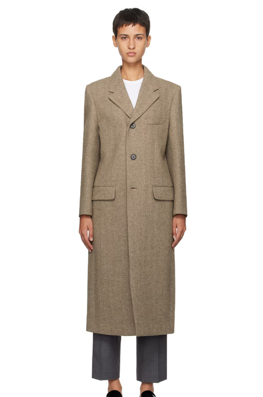 A woman wearing Dunst brown 2-way coat
