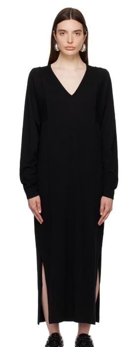 A woman wearing House of Dagmar black paneled maxi dress