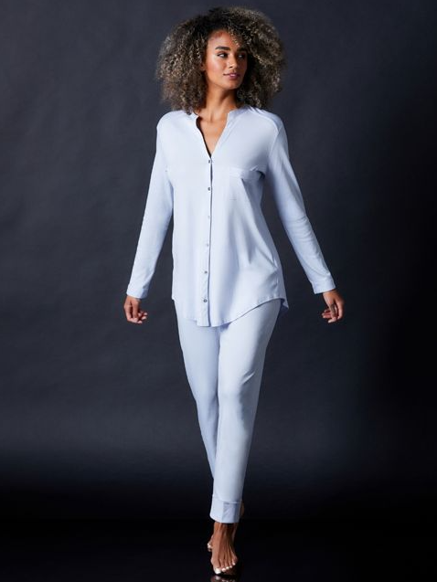 A woman wearing Journelle blue long sleeve pajama