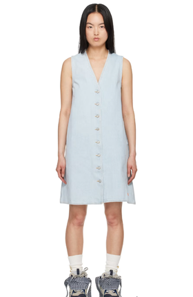 A woman wearing ERL blue levi's edition denim minidress