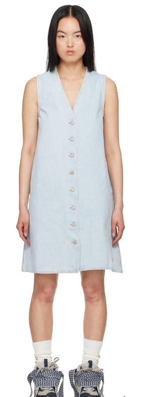 A woman wearing ERL blue levi's edition denim minidress
