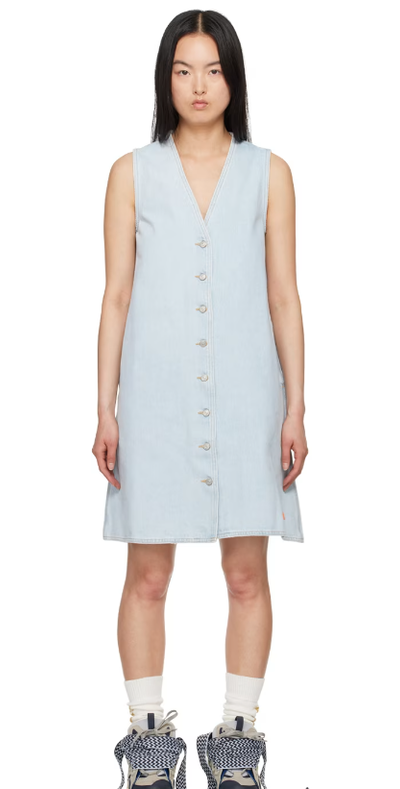 A woman wearing ERL blue levi's edition denim minidress
