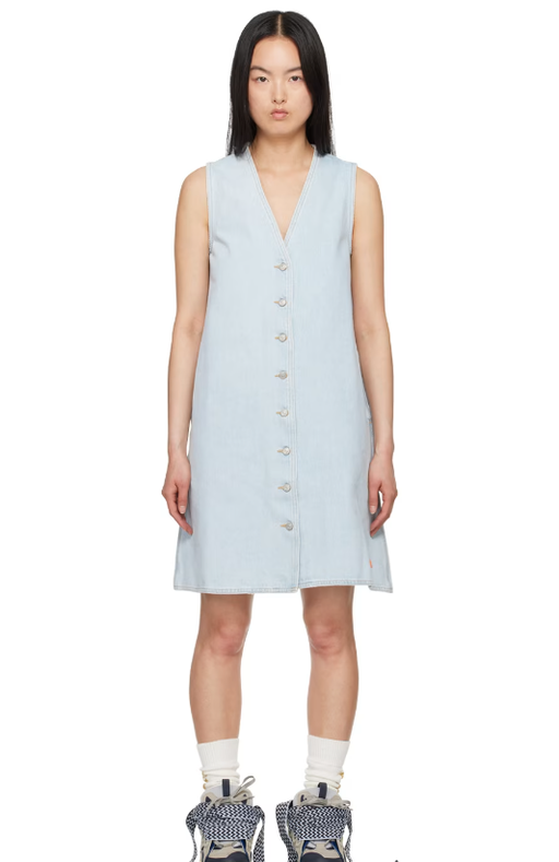 A woman wearing ERL blue levi's edition denim minidress