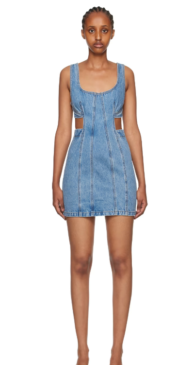 A woman wearing GRLFRND blue vivi denim minidress