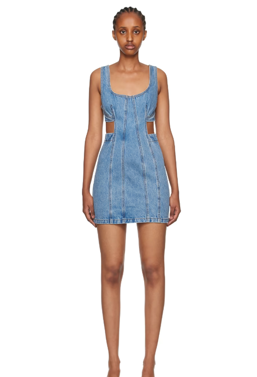 A woman wearing GRLFRND blue vivi denim minidress