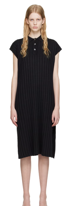 A woman wearing HOPE black nad midi dress
