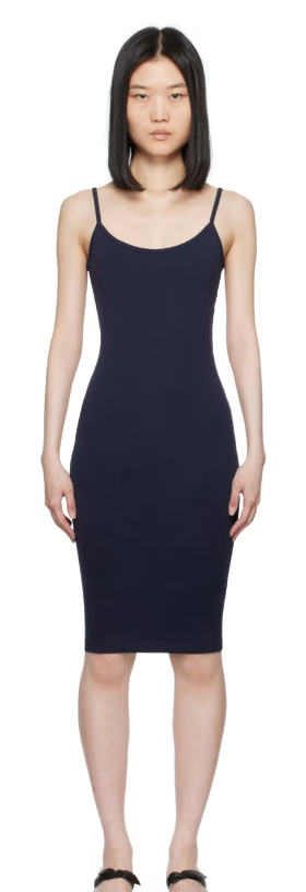 A woman wearing FLORE FLORE navy bibi minidress