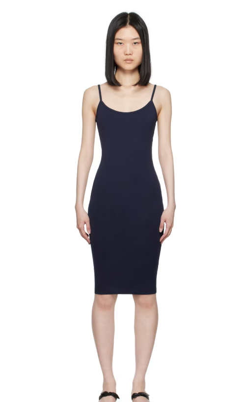 A woman wearing FLORE FLORE navy bibi minidress