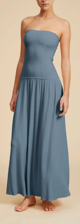 A woman wearing Live the Process blue thistle petra dress