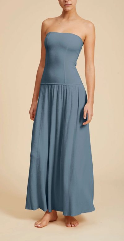 A woman wearing Live the Process blue thistle petra dress