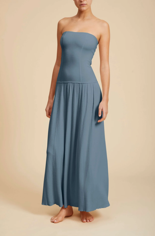 A woman wearing Live the Process blue thistle petra dress