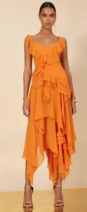 A woman wearing BCBGMAXAZRIA russet orange annabel ruffle dress