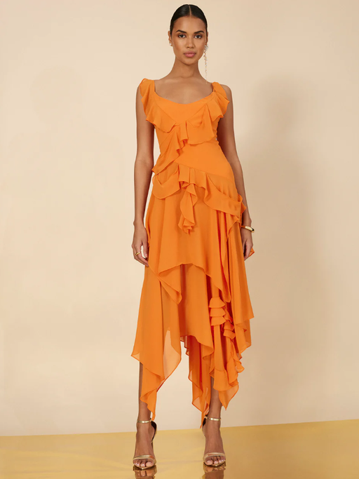 A woman wearing BCBGMAXAZRIA russet orange annabel ruffle dress