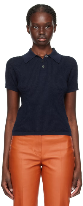 A woman wearing Guest in Residence navy shrunken polo