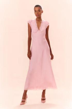 A woman wearing LoveShackFancy dusty quartz theodore printed maxi dress