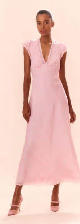 A woman wearing LoveShackFancy dusty quartz theodore printed maxi dress