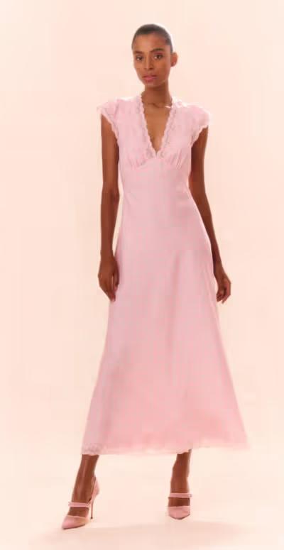 A woman wearing LoveShackFancy dusty quartz theodore printed maxi dress