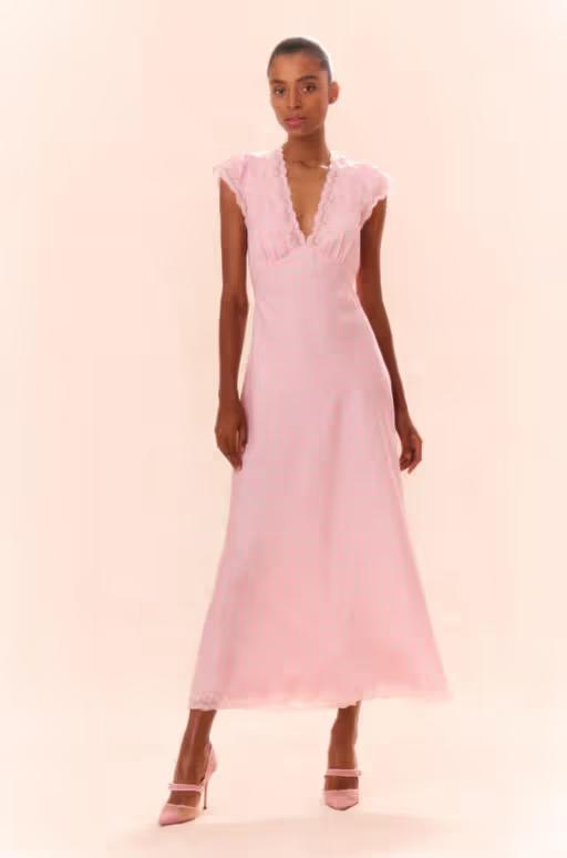 A woman wearing LoveShackFancy dusty quartz theodore printed maxi dress