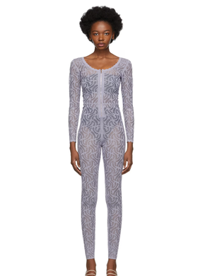A woman wearing Diotima purple lace jumpsuit