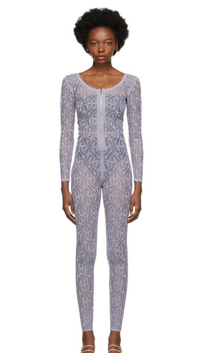 A woman wearing Diotima purple lace jumpsuit