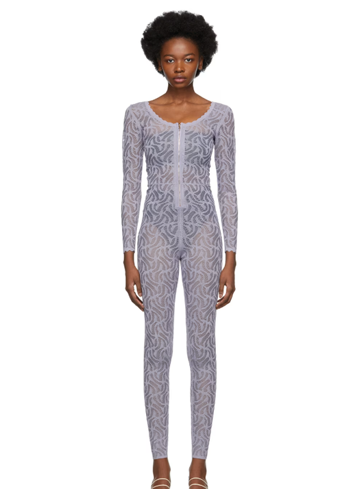 A woman wearing Diotima purple lace jumpsuit