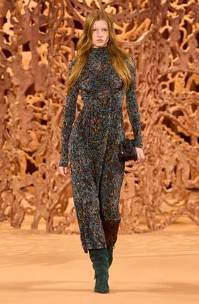 A woman wearing Ulla Johnson blue printed jersey maxi dress