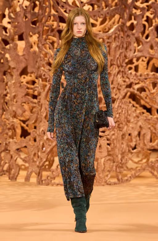 A woman wearing Ulla Johnson blue printed jersey maxi dress