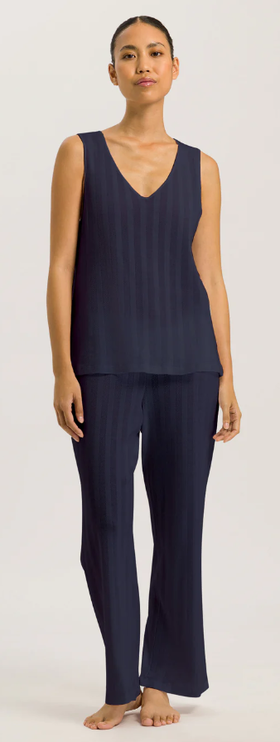 A woman wearing Hanro deep navy tank cropped pajama
